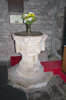 The ancient font was found in his garden by the vicar in the 1920s